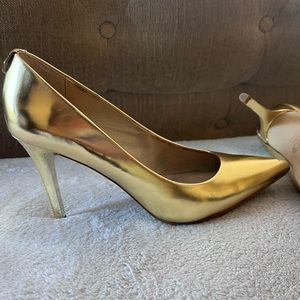 Beautiful gold pumps by Michael Kors